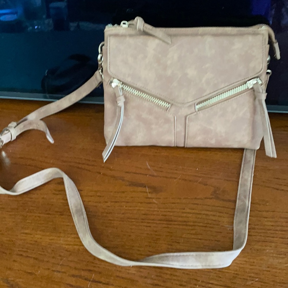 Tan faux suede francescas crossbody bag.